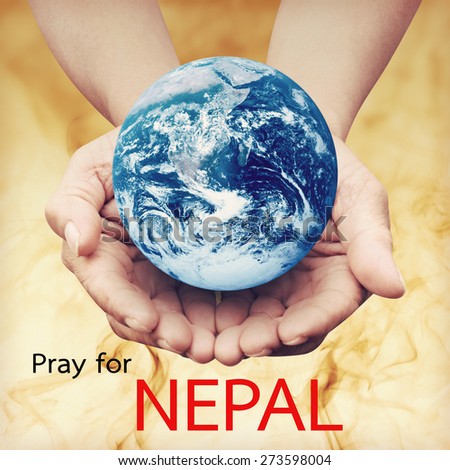 Pray for NEPAL Earthquake Crisis nature abstract on helping hands Elements of this image furnished by NASA