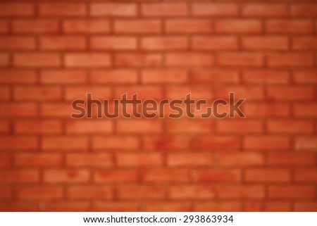 Pinhole lens on digital camera shot on blur red brick wall