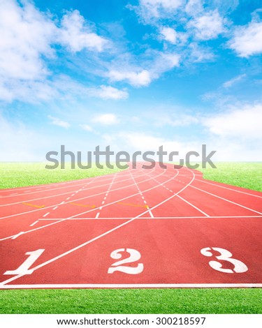 Marketing and business competition positioning concept for advertisement background on running tracks One Two Three with green grass field and blue sky