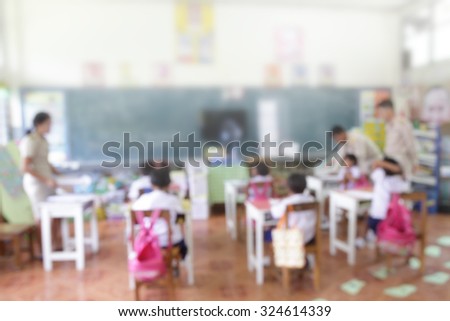 Blur Blurred school teachers action in the classroom with some students on education supervision for improve knowledge quility