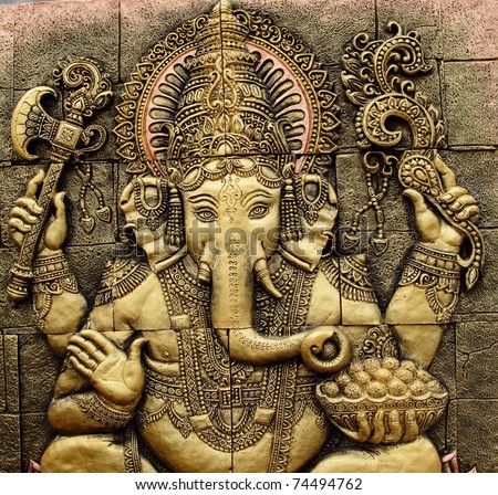 The Indian God Ganesha  made from clay in low relief carving  jig saw image style.