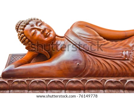 Large wood crafted sleep Buddha image in Thailand isolated on white background.