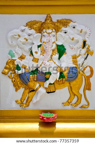 Indian God Ganesha avatar image in stucco low relief technique with vivid color,Wat Samarn, Chachoengsao,Thailand.