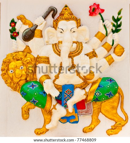 Indian or hindu God Ganesha avatar image in stucco low relief technique with vivid color,Wat Samarn, Chachoengsao,Thailand.