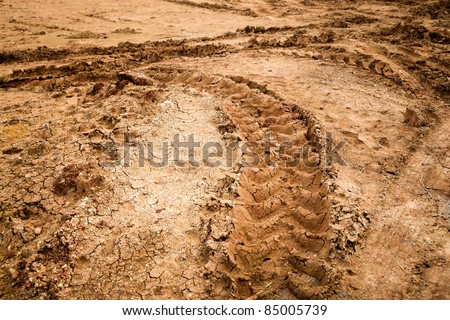 wheel tracks on dirt