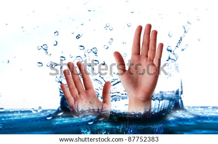 hands raised from water splash stop motion