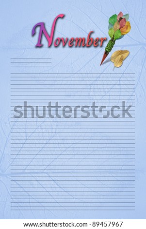 series of months on blue leaves fossil and decorated with pencil like wood log and lines as a sheet of blank note paper