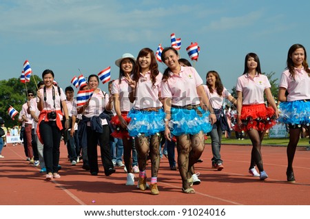 NAKHONRATCHASIMA, THAILAND - DECEMBER 18: Paraders from district hospitals join for the King\'s Father Birthday Sport Day on Dec 18, 2011 at Nakhonratchasima Sport Complex, Thailand.
