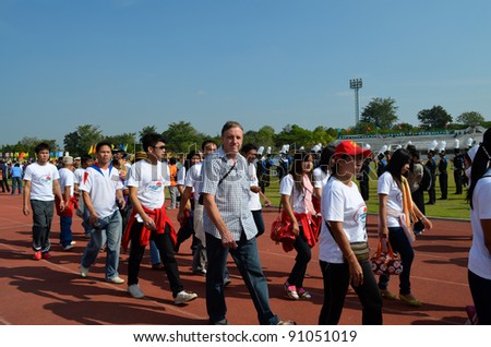 NAKHONRATCHASIMA, THAILAND - DECEMBER 18: Paraders from various district hospitals take part at King\'s Father Birthday Sport Day on Dec 18, 2011 at Nakhonratchasima Sport Complex in Nakhonratchasima.