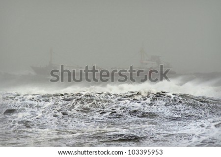 A ship in the ocean during stormy weather
