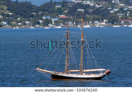 Traditional British Sea ship on the shore of Russell New Zealand for the celebration of Waitangi Day.