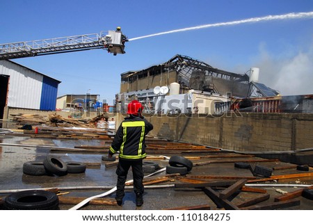 ASHDOD, ISRAEL - APRIL 17: Firefighters work to extinguish a large fire in a chemical plant on Thursday, April 17, 2008 in Ashdod, Israel.
