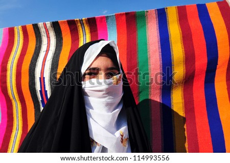 WESTERN NEGEV ISRAEL - NOVEMBER 26 2008:Bedouin woman traditionally dressed in the Negev Desert, Israel.The nomadic Arabs live by rearing livestock in the deserts of southern Israel.
