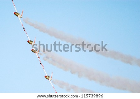 HATZERIM - JUNE 28: Acrobat air show takes place during a graduation ceremony of Israeli Air Force pilots over the Hatzerim Air Force base near the Southern Israeli city of Beer Sheva on June 28, 2007