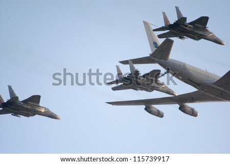 HAZERIM - JUNE 28: Boeing 747 plane is fueling F-15 E Srike Eagle airplanes over the Hatzerim Air Force base near the Southern Israeli city of Beer Sheva on June 28, 2007.
