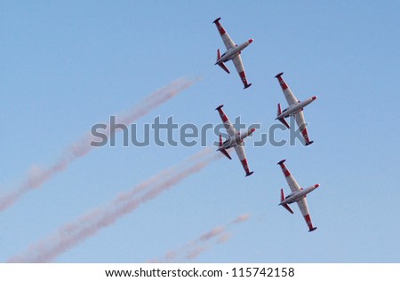 HATZERIM - JUNE 28: Acrobat air show takes place during a graduation ceremony of Israeli Air Force pilots over the Hatzerim Air Force base near the Southern Israeli city of Beer Sheva on June 28, 2007