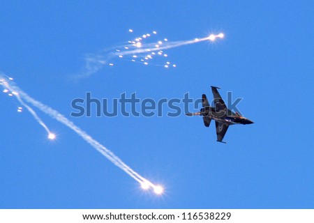 BEERSHEBA, ISRAEL-JUNE 28 2007:General Dynamics F-16 Fighting Falcon fly above Hatzerim Air Force base in Beersheba,Israel.It's an air superiority day fighter and a successful all-weather aircraft.