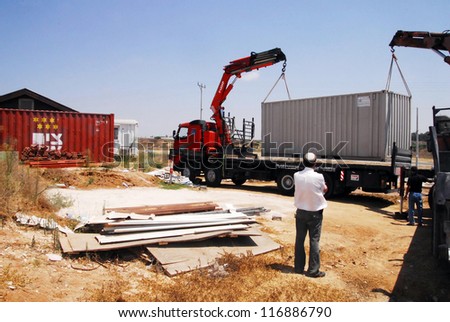 NITZAN - JULY 30: Evacuated families at the temporary housing project for Gaza Strip evacuees on July 30, 2008 in Nitzan, Israel.Israel\'s unilateral disengagement plan was on August 15, 2005