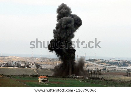 GAZA STRIP - DECEMBER 27: Artillery explosion in Gaza Strip during Cast Lead operation on December 27 2008. It was a three-week armed conflict in the Gaza Strip during the winter of 2008-2009.