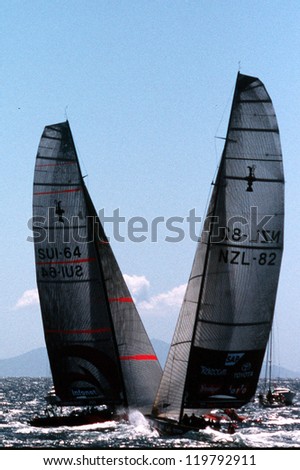 AUC - MARCH 1:Team Alinghi and Team NZ during the Americas cup of 2003 on March 01 2003 in Auckland New Zealand.It was contested between Team NZ and the winner of the 2003 Louis Vuitton Cup Alinghi