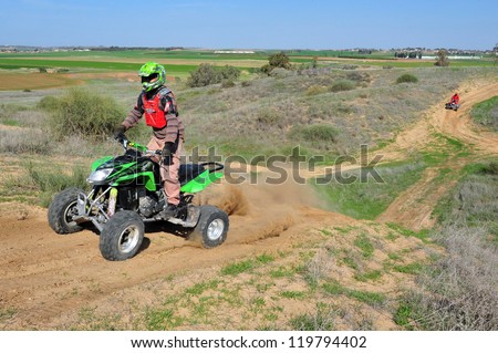 WESTERN NEGEV - JAN 22:An ATV riders on a  Quad bike on January 22 2011 Western Negev , Israel. Off road vehicles were first made available in the early 1960s.