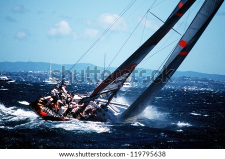 AUC - MARCH 1:Team Alinghi sails it yacht during the Americas cup of 2003 on March 01 2003 in Auckland New Zealand.It was contested between Team NZ and the winner of the 2003 Louis Vuitton Cup Alinghi. Best for smaller scale.