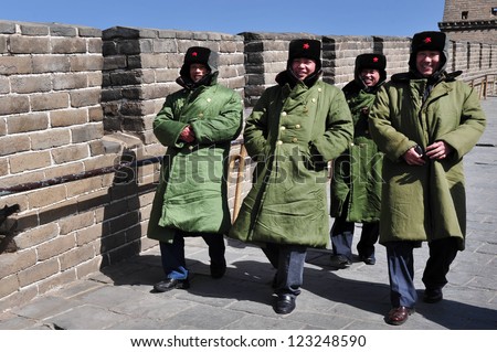 BEIJING - MAR 10:Chinese soldiers on the Great Wall of China on March 10 2008.The PLA is the worlds largest military force and the worlds active standing army, with approximately 2.25 million members.