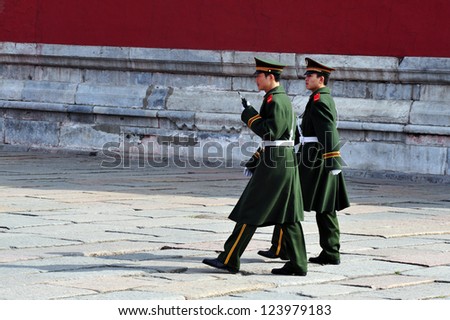 BEIJING - MARCH 11:Chinese soldiers guards inside the Forbidden City on March 11 2009 in Beijing,China.The Forbidden City was the Chinese imperial palace since the Ming Dynasty.