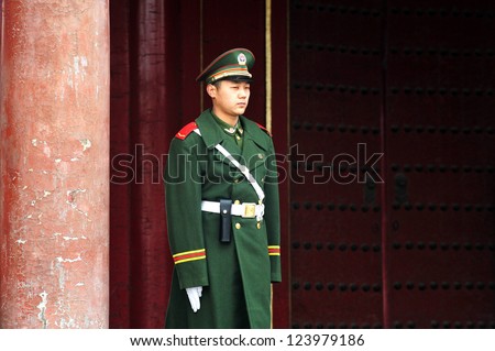 BEIJING - MARCH 11:Chinese soldier guards inside the Forbidden City on March 11 2009 in Beijing,China.The Forbidden City was the Chinese imperial palace since the Ming Dynasty.
