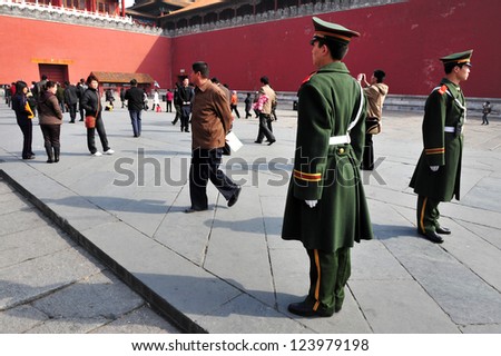 BEIJING - MARCH 11:Chinese soldiers guards inside the Forbidden City on March 11 2009 in Beijing,China.The Forbidden City was the Chinese imperial palace since the Ming Dynasty.