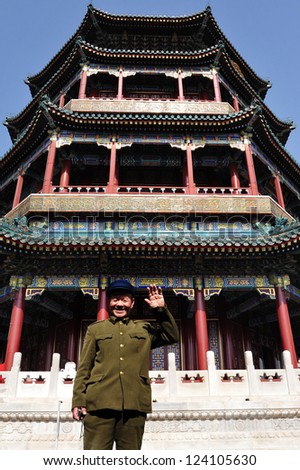 BEIJING - MARCH 14:An old Chinese man wearing Mao Tzetung suite and hat visit at the Summer Palace in Beijing, China on March 14 2007.Chairman Mao Zedong is still being worshiped all over China.