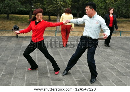 BEIJING-MARCH 15:Chinese people dancing at the temple of heaven park on Mar 15 2009 in Beijing, China.It's the most popular park in Beijing used by thousands of people for sport and leisure daily