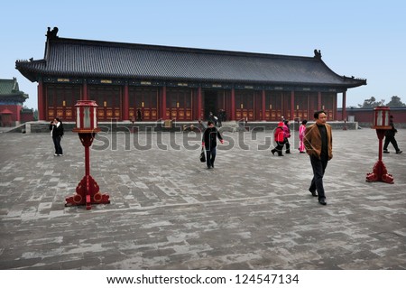 BEIJING-MARCH 15: Visitors at the Temple of Heaven on Mar 15 2009 in Beijing, China. The Temple of Heaven is regarded as one of the Beijing\'s Top 10 tourist attractions.