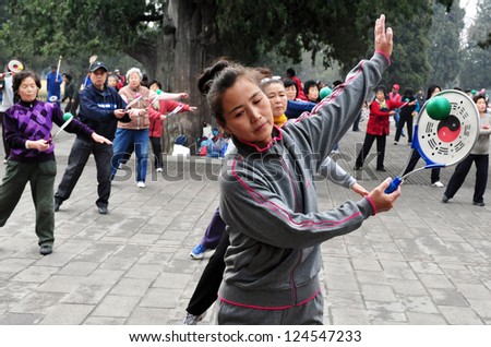 BEIJING-MARCH 15:Chinese people exercises at the temple of heaven park on Mar 15 2009 in Beijing, China.It\'s the most popular park in Beijing used by thousands of people for sport and leisure daily