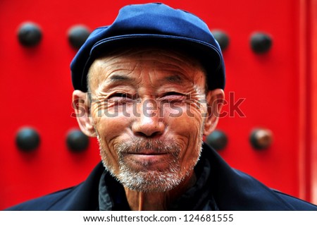 BEIJING - MARCH 11:Chinese man at the Forbidden City on March 11 2009 in Beijing,China. The average life expectancy among Chinese men is 72 years