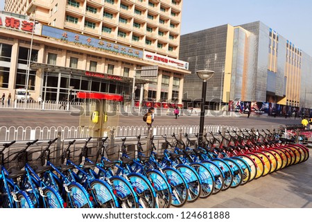 BEIJING - MARCH 11: A line of lot rental bike.on March 11 2009 in Beijing,China.There are over a half billion bicycles in China.