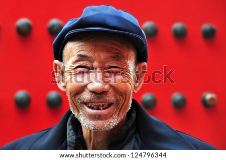 BEIJING - MARCH 11:Chinese man at the Forbidden City on March 11 2009 in Beijing,China. The average life expectancy among Chinese men is 72 years.