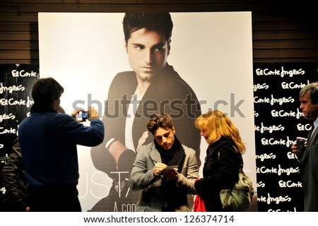MADRID - MAR 01:The Spanish singer David Bustamante promoting his new album for his local fans in the streets of madrid on March 01 2010. He has sold over 1,700,000 albums in Spain and Latin America.