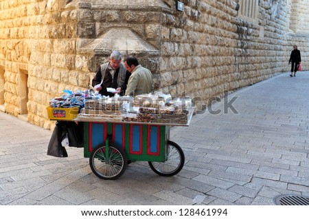 JERUSALEM - NOV 12:Cart of food for sale  on November 12 2008 in Jerusalem old city.Jerusalem is a holy city to the three major religions:Judaism, Christianity and Islam.