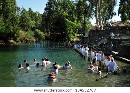 Tiberias - May 18:Christian Pilgrims During Mass Baptism Ceremony At The Jordan River In North Israel On May 18 2009.In Christian Tradition, Jesus Was Baptised In The River Jordan By John The Baptist.