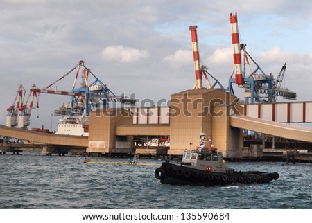ASHDOD - FEB 03:Tugboat in Ashdod seaport on February 03 2010.It\'s one of Israel\'s two main cargo ports and one of the few deep water ports in the world to be built on the open sea.