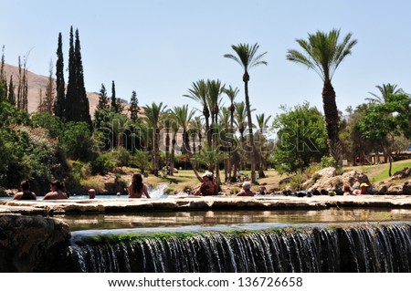 BEIT -  SHEAN, ISRAEL - MAY 17:Visitors at Gan Hashlosha on May 17 2009 near Beit She\'an, Israel.The spring water of the park maintains a constant, year-round temperature of 28 degrees Celsius.