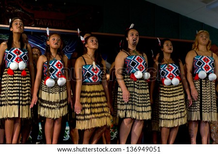 WAITANGI - FEB 6:Maori women sing and dance during Waitangi Day on February 6 2013 in Waitangi NZ.It\'s a New Zealand public holiday to celebrate the signing of the Treaty of Waitangi in 1840.