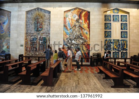 NAZARETH, ISRAEL - JUNE 15:Visitors at the Basilica of the Annunciation on June 15 2009.It's built over a cave that from the 4th century was a pilgrimage site associated with the Annunciation.