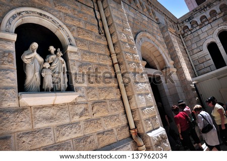NAZARETH, ISRAEL - JUNE 15:Visitors at the Basilica of the Annunciation on June 15 2009.It\'s built over a cave that from the 4th century was a pilgrimage site associated with the Annunciation.
