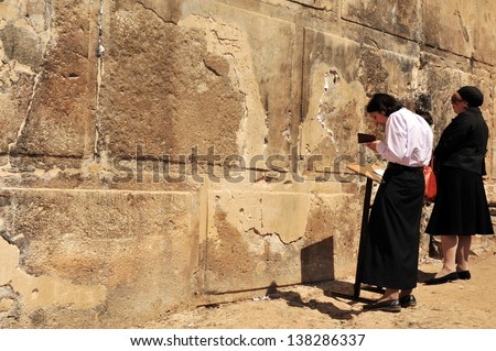 HEBRON, ISRAEL - SEP 08:Jewish women pray at the Cave of the Patriarchs in Hebron on September 09 2009.According to tradition all the Patriarchs and Matriarchs of the Jewish people buried there.