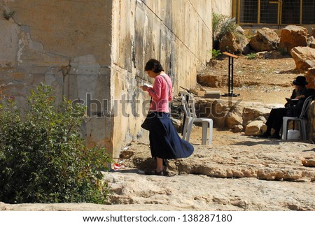 HEBRON, ISRAEL - SEP 08:Jewish woman pray at the Cave of the Patriarchs in Hebron on September 09 2009.According to tradition all the Patriarchs and Matriarchs of the Jewish people buried there.