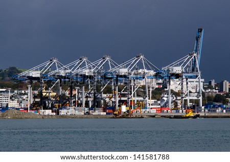 AUCKLAND,NZ - MAY 29:Container cranes on Fergusson Wharf at Ports of Auckland on May 29 2013.It\'s New Zealand\'s largest commercial port, its turnover of more than NZ$20 billion per year