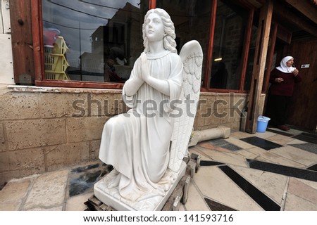 ACRE,ISR - DEC 13:Christian Catholic statues on Dec 13 2009.According to the Israeli Central Bureau of Statistics from 46,300 citizens in Acre 67% are Jewish 25% Muslims and 2.5% are Christian Arabs.