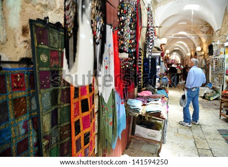 ACRE, ISR - MAY 13:Visitors buy goods in the old market of Acre on May 13 2009.Acre is one of the oldest continuously inhabited sites in Israel.